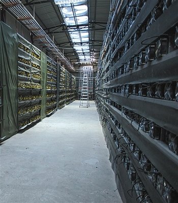 Aerial view of a vast mining farm, showcasing the scale of crypto mining operations