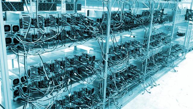 An array of mining rigs in a secure hosting facility, optimized for Kaspa mining